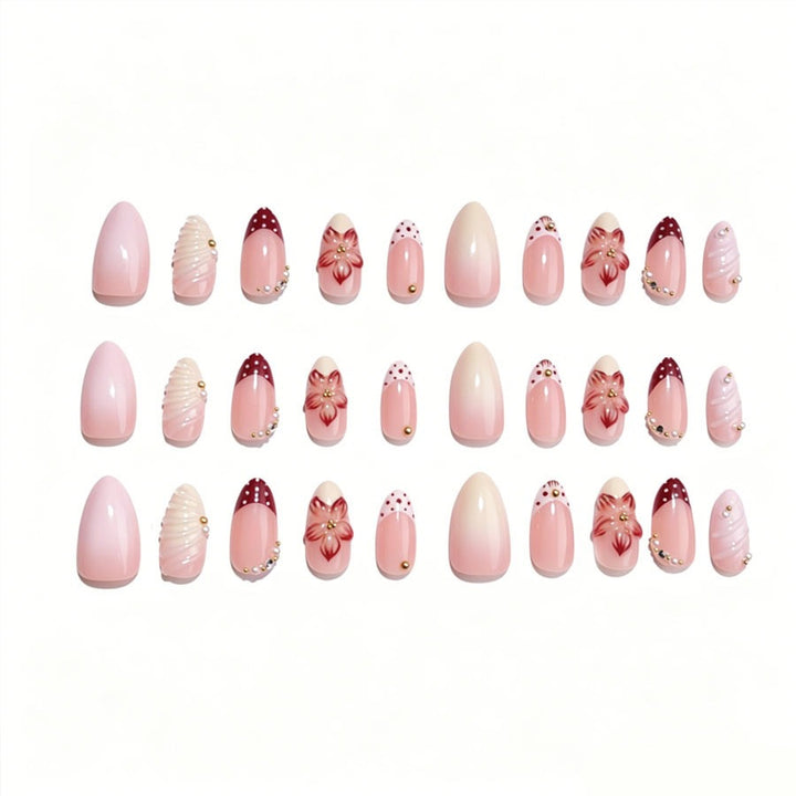 Artificial nail set with floral details and glitter accents Stornfield
