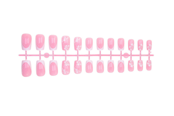 Artificial nail set with elegant French design and delicate flower patterns Stornfield