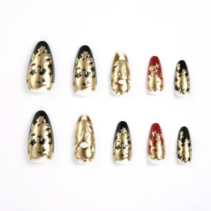 Elegant artificial nails with gold and black pattern Stornfield