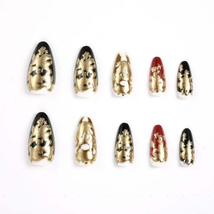 Elegant artificial nails with gold and black pattern Stornfield
