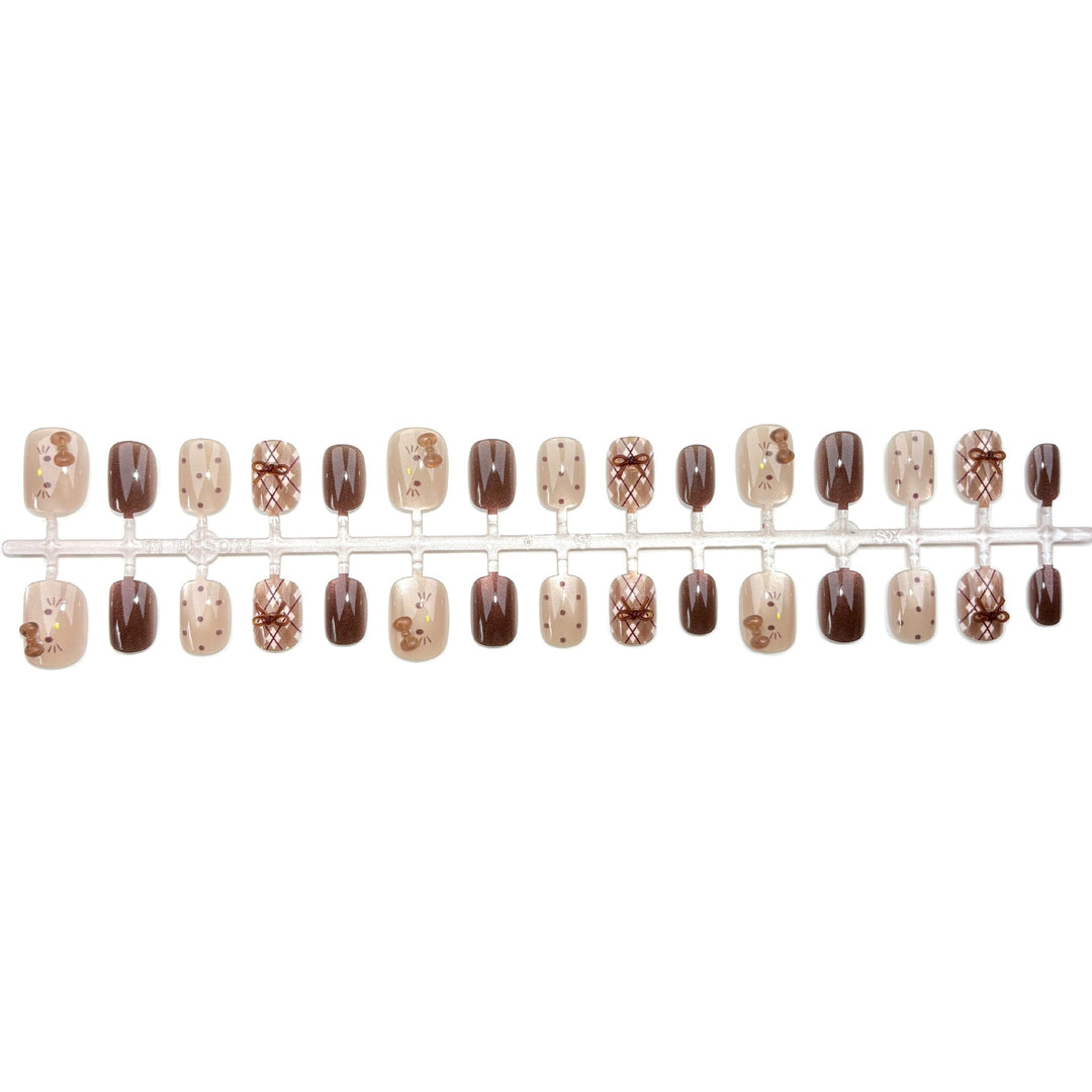 Artistic Press-On Nail Set with Whimsical Designs