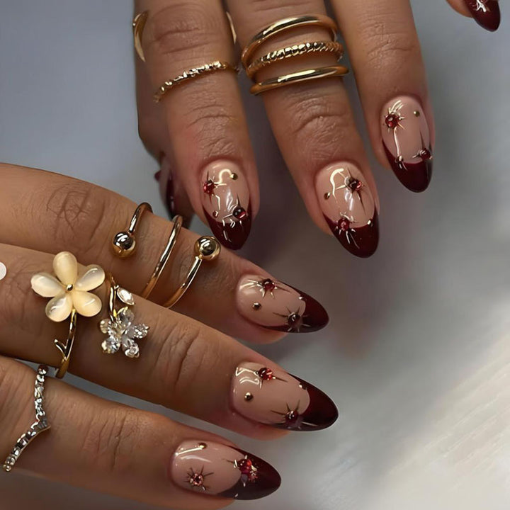 Acrylic nail set with glamorous embellishments and elegant accents Stornfield