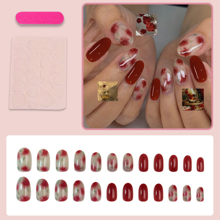 Nail art set with floral accents and glossy finish Stornfield