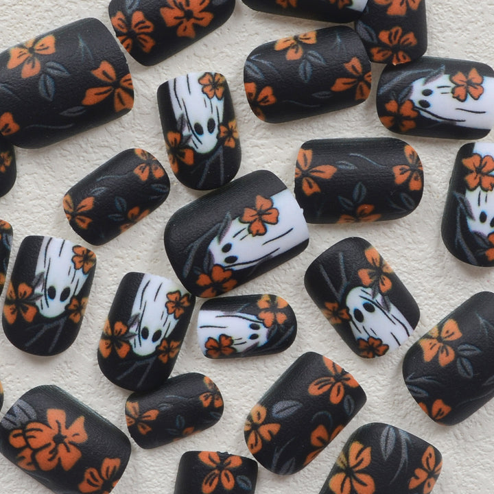 Acrylic nail set with spooky ghost design and floral accents Stornfield