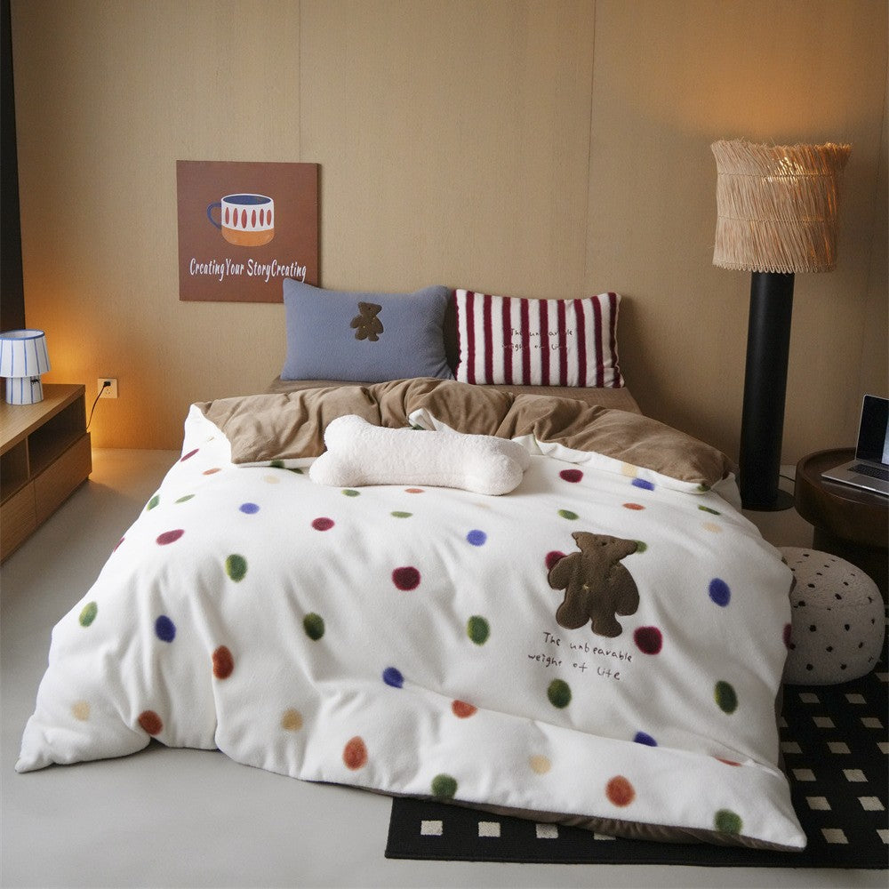 Fluffy reversible bedding set with polka dot design and plush applications