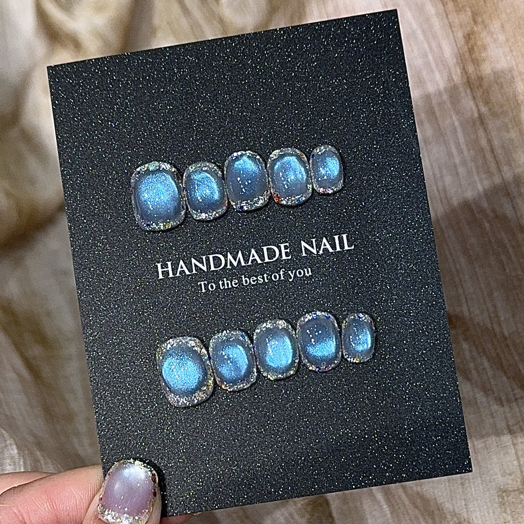 Handmade art nails with shimmering effects Stornfield