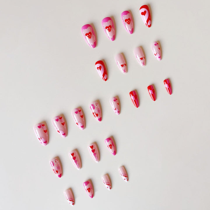 Acrylic nail set with romantic heart motifs and modern designs Stornfield