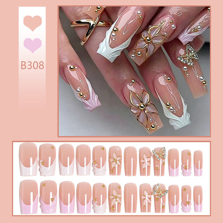Artificial nail set with elegant floral and glitter decorations Stornfield