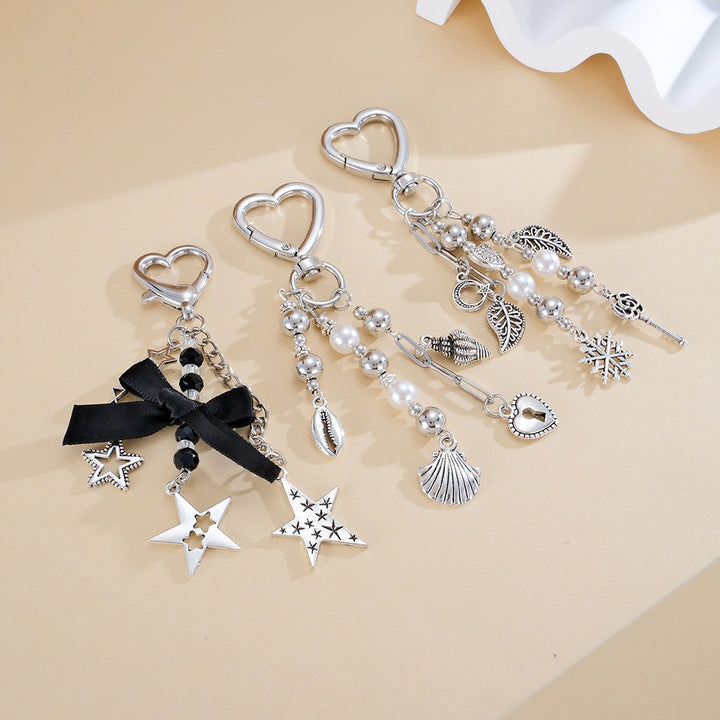 Keychain with Sparkling Stars and Bow Design Stornfield