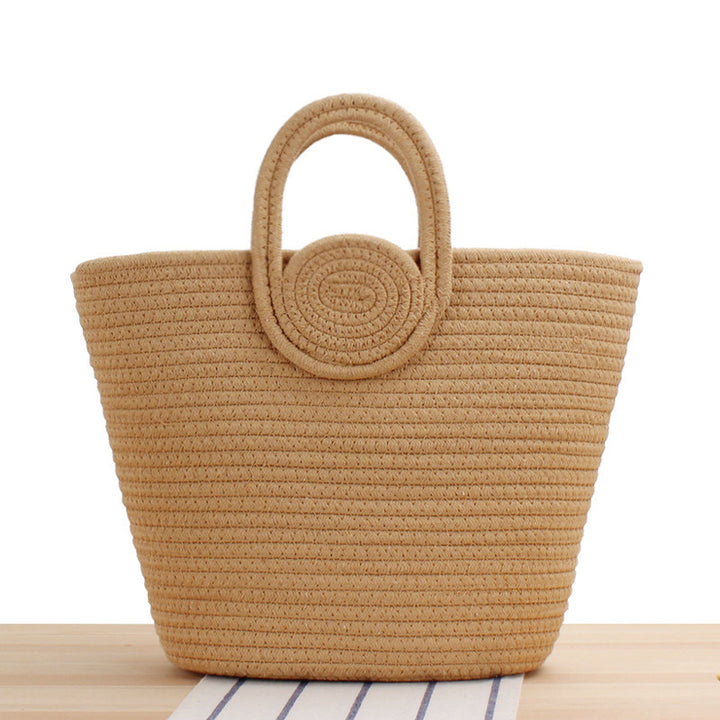 Fashionable handbag with playful pompom decoration Stornfield