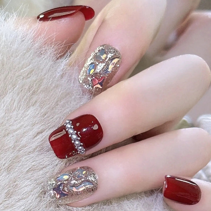 Glamorous artificial nail set with sparkling 3D applications and elegant embellishments Stornfield