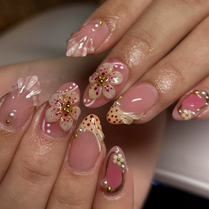 Artificial nail set with elegant rose and gold embellishments Stornfield