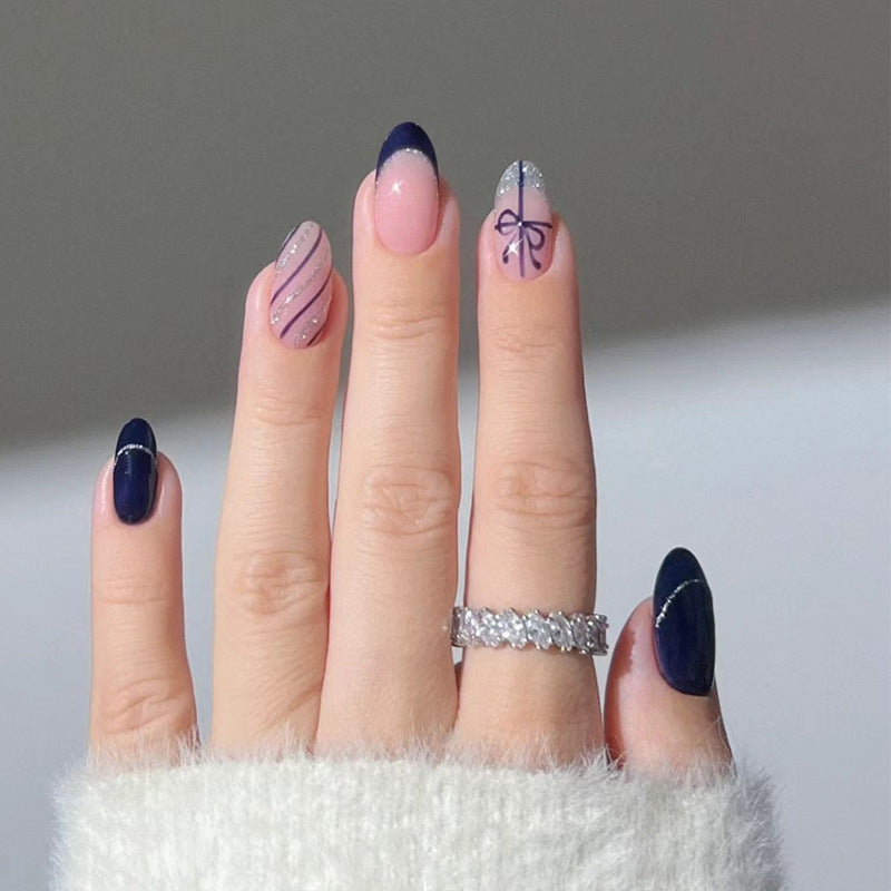 Artistic Press-On Nail Set with Glitter and Bow Design Stornfield