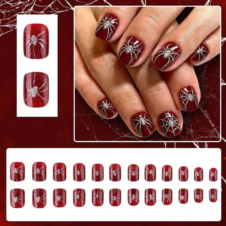 Acrylic nail set with spooky spider and glitter accents Stornfield