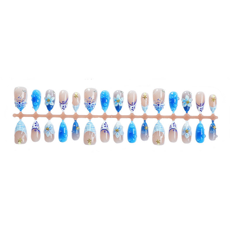 Artificial nail set with maritime motifs and floral design Stornfield