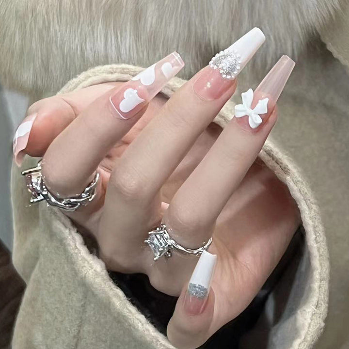 Artificial nail extensions with elegant floral design Stornfield