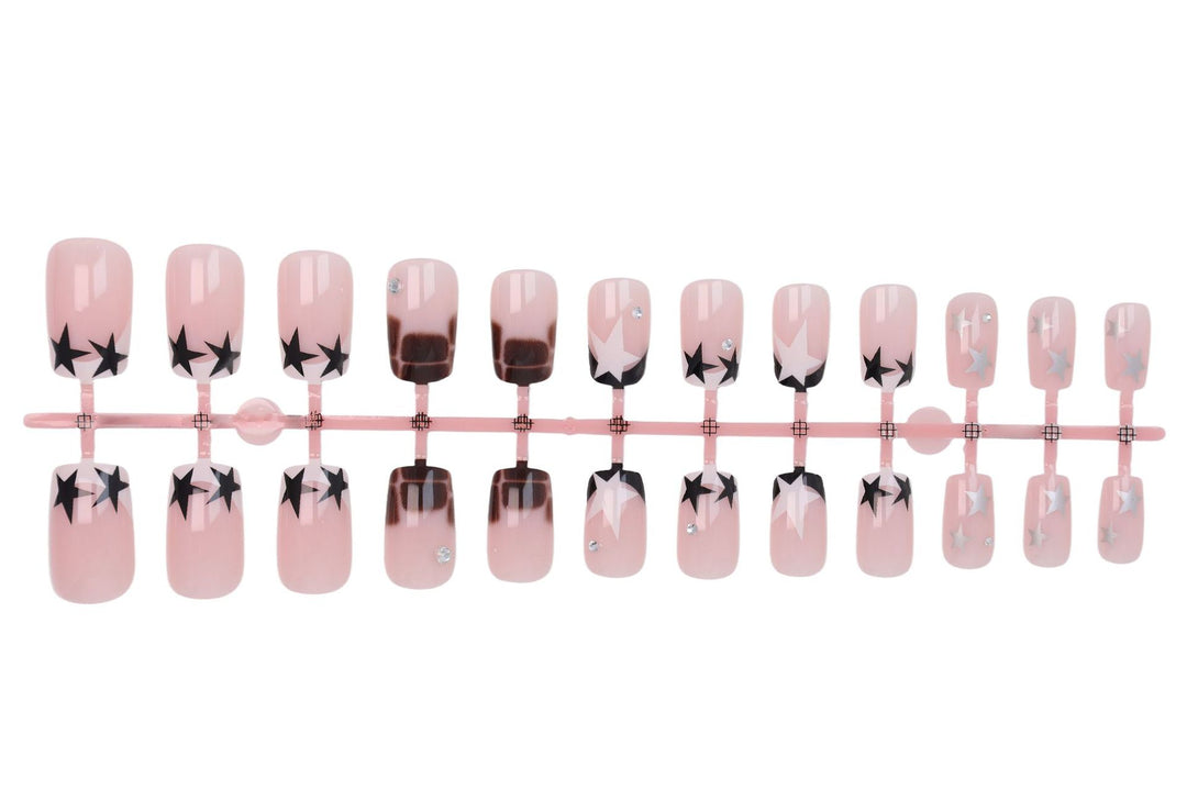 Acrylic nail set with glamorous star and glitter accents Stornfield
