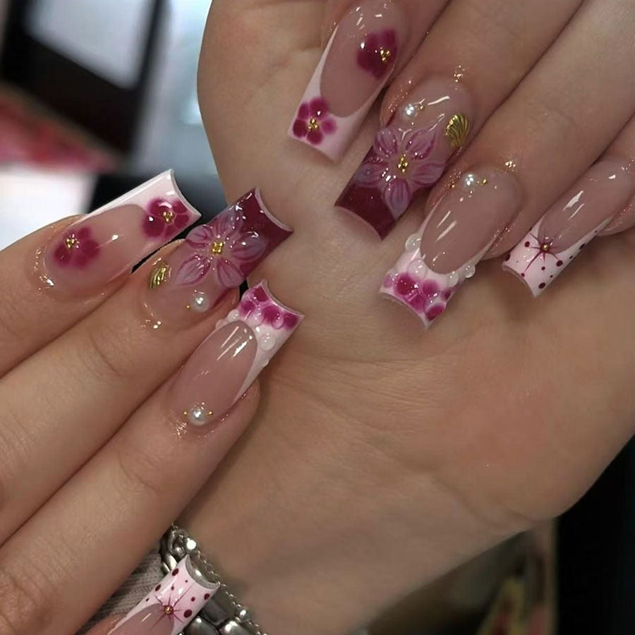 Nail art set with floral 3D details and glitter accents Stornfield