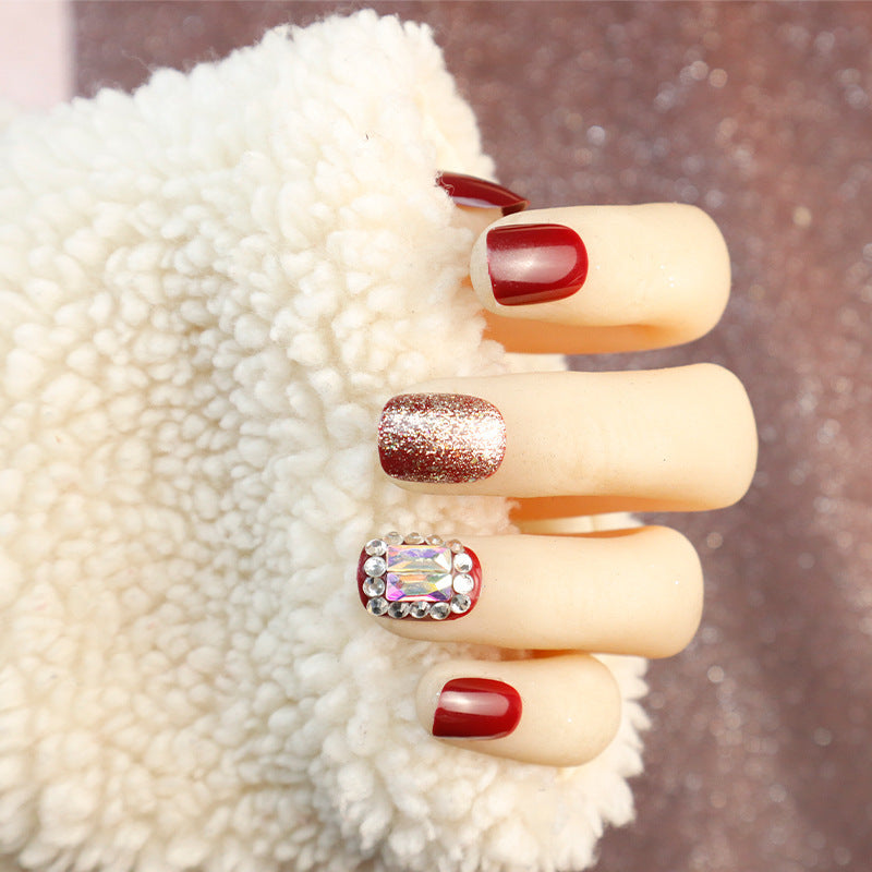 Glamorous Press-On Nail Set with Glitter and Rhinestone Accents Stornfield