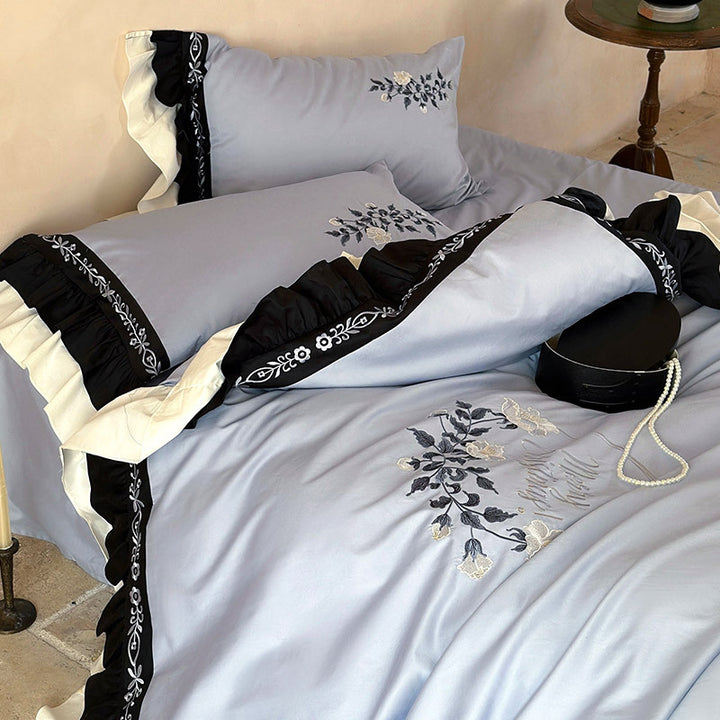 Elegant bed linen set made of cotton satin with embroidery, contrasting frill and round cushion