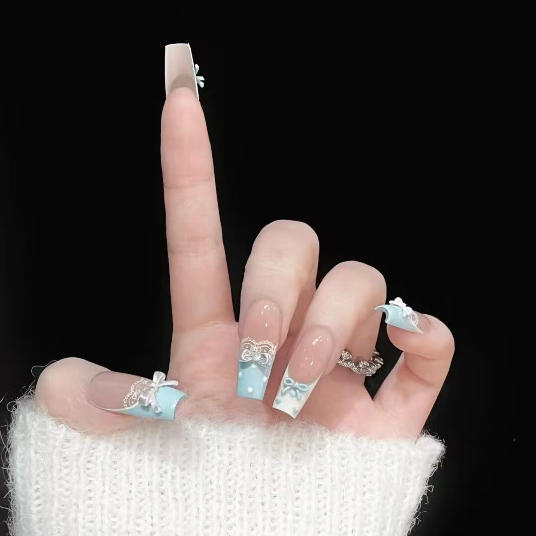 Elegant artificial nails with bow design Stornfield