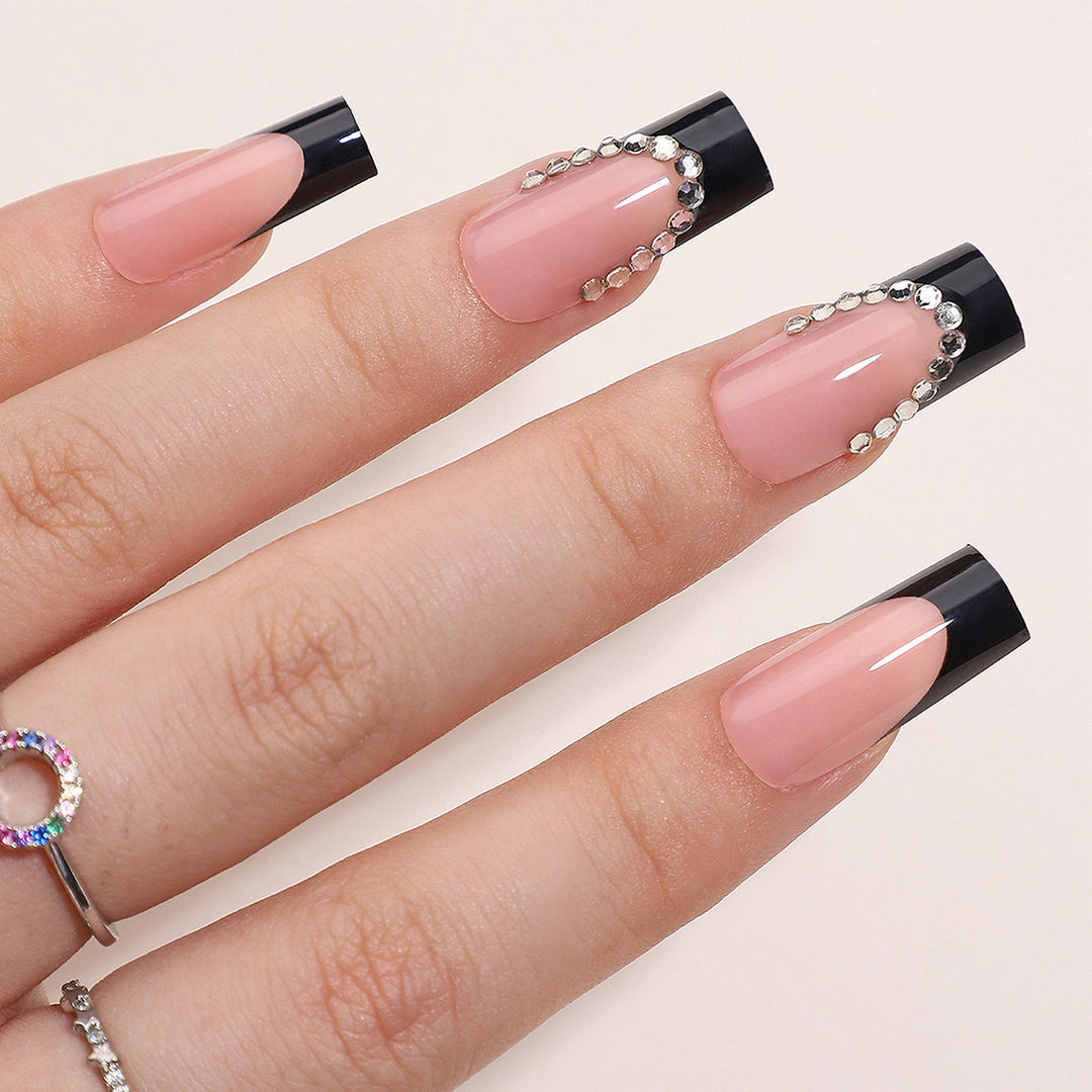 Artificial nail set with elegant tips and glitter accents Stornfield