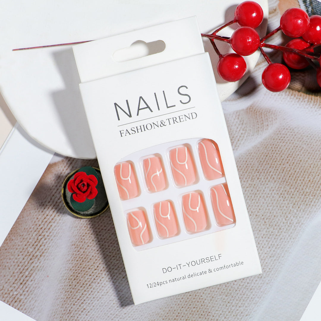 Elegant Press-On Nail Design with Artistic White Swirl Stornfield