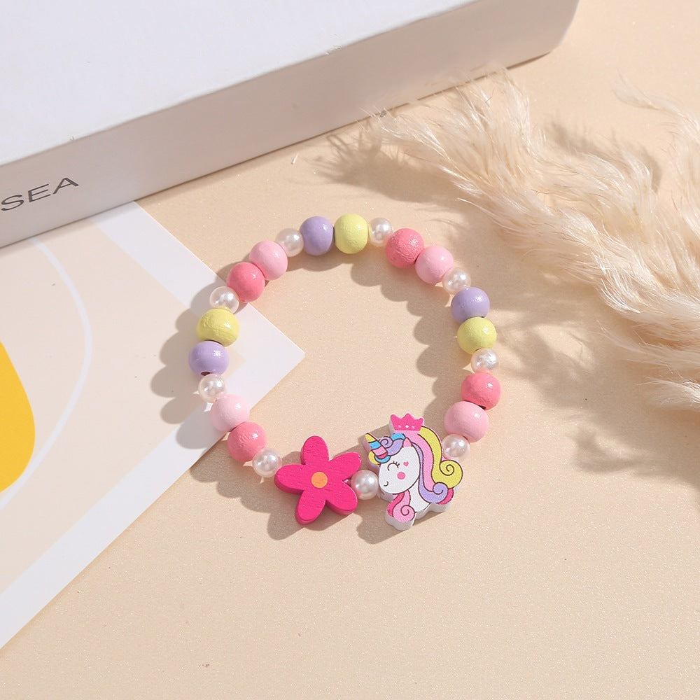 Playful children's bracelet with unicorn and flower motif Stornfield
