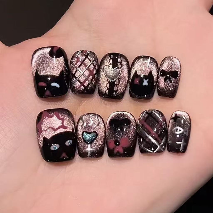 Creative nail art with playful cat design