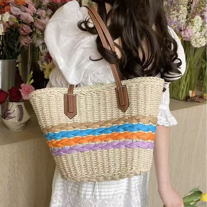 Shoulder bag made of braided material with colorful detail Stornfield