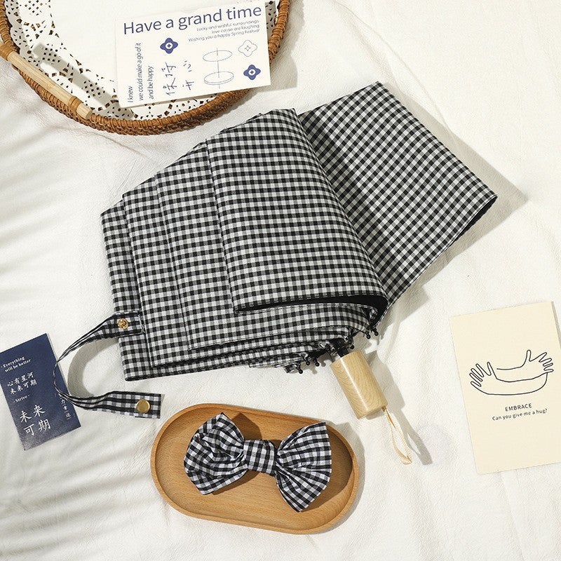 Ladies elegant folding umbrella with classic check pattern Stornfield