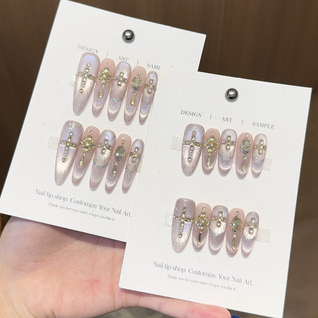 Artificial nails with elegant rhinestone and glitter details Stornfield
