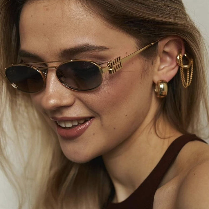 Women's elegant oval sunglasses with luxurious metal frame Stornfield