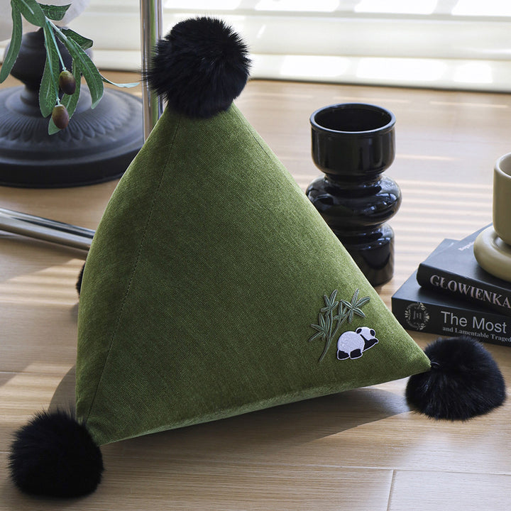 Decorative pillow in pyramid shape with animal design