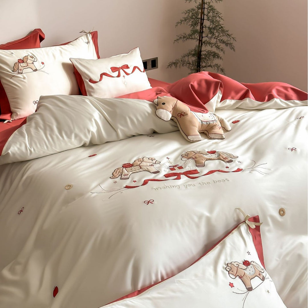 Satin bedding set with embroidered rocking horse motif