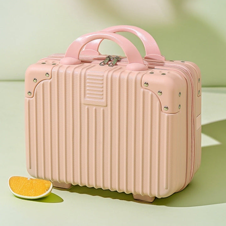 structured hard-shell vanity travel case with faux-leather corner reinforcements and dual top handles Stornfield
