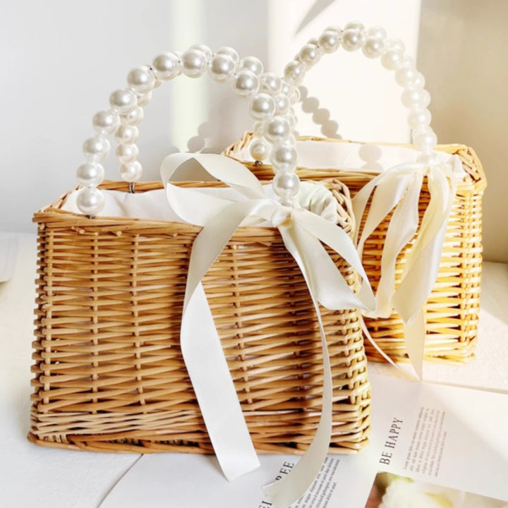 Ladies handbag made of braided material with elegant pearl handles Stornfield