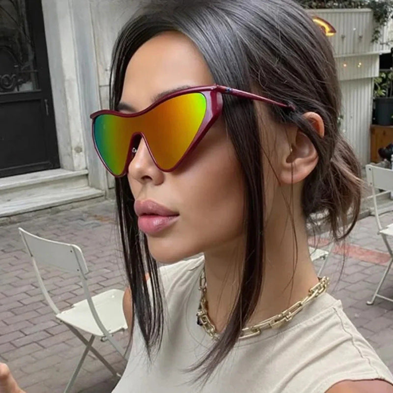 Ladies extravagant shaped sunglasses with protective UV filter Stornfield