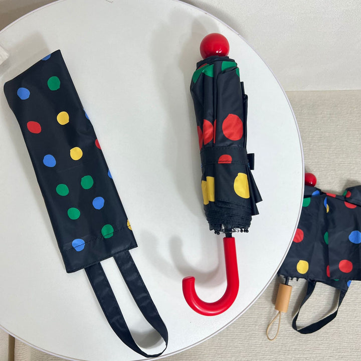 Ladies designer foldable umbrella with colorful polka dot pattern Stornfield