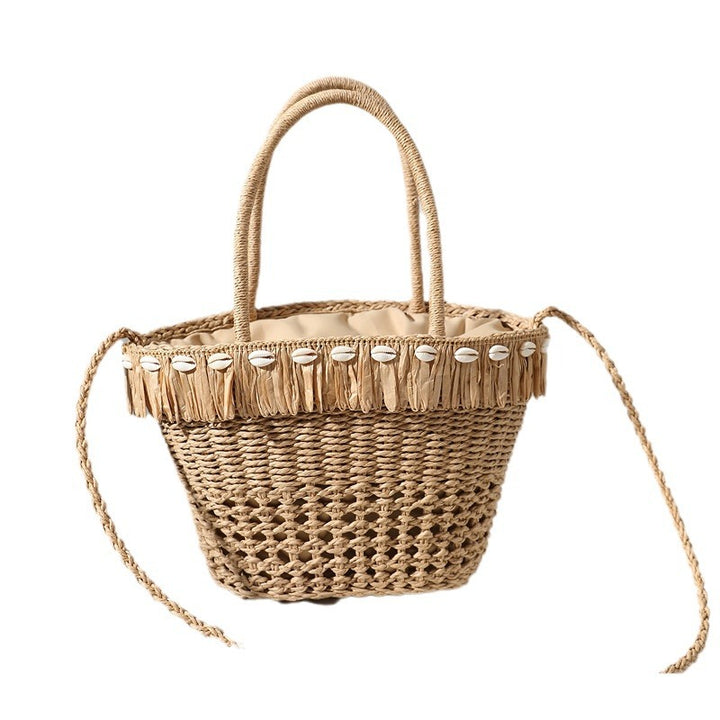 Braided straw bag with decorative tassel detail Stornfield
