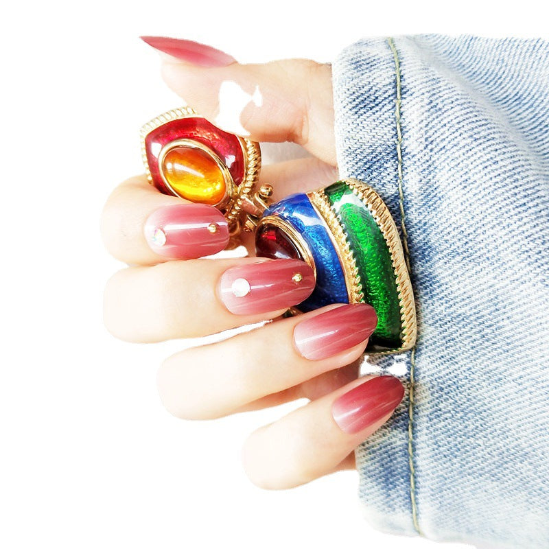 Artificial nails with elegant ombre effect and rhinestone decorations Stornfield