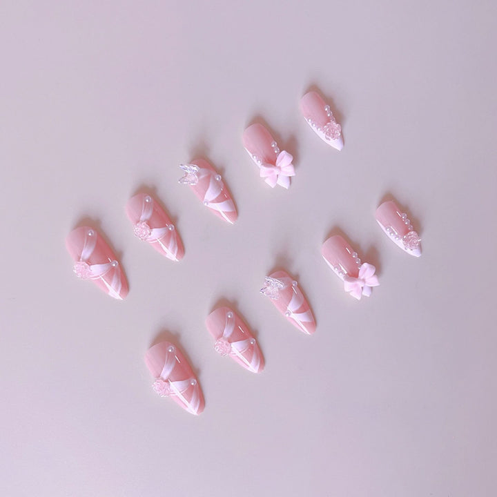 Artificial nail set with romantic 3D flower and bow decorations Stornfield