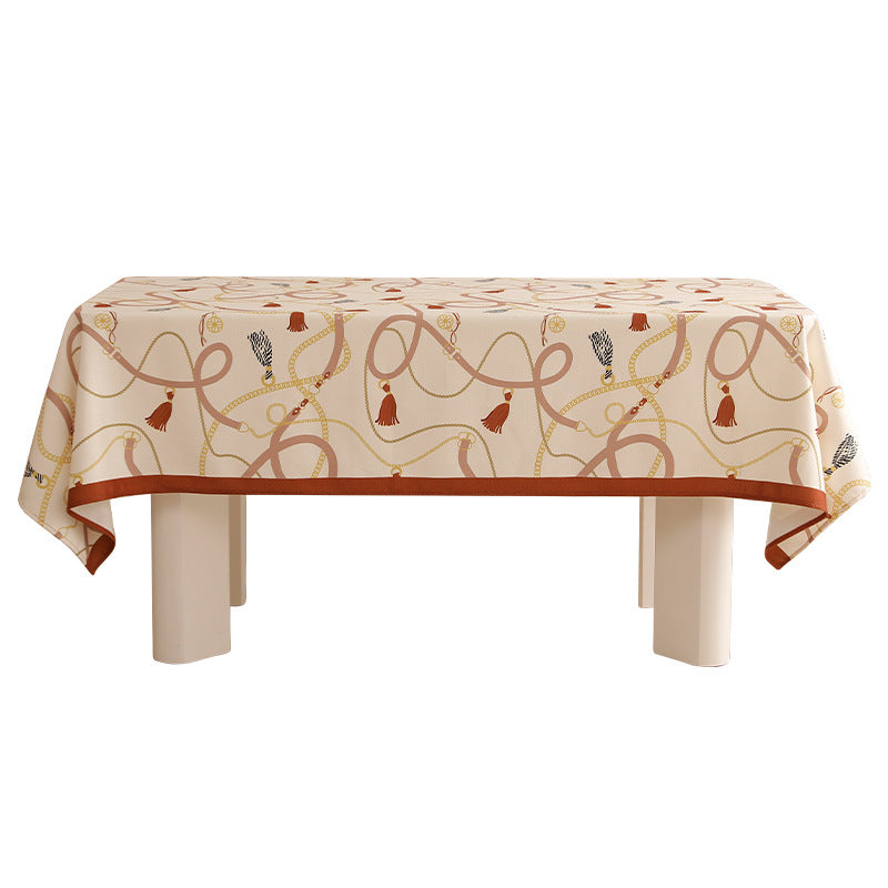 Rectangular decorative tablecloth with cord and tassel pattern as well as contrasted hem edge Stornfield