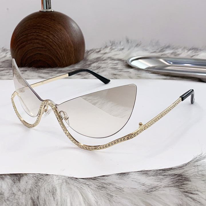Women's extravagantly shaped Cat-Eye sunglasses with sparkling appliqués Stornfield