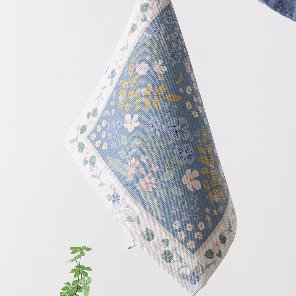 Flat-woven cotton runner with fine floral medallion decor and decorative border