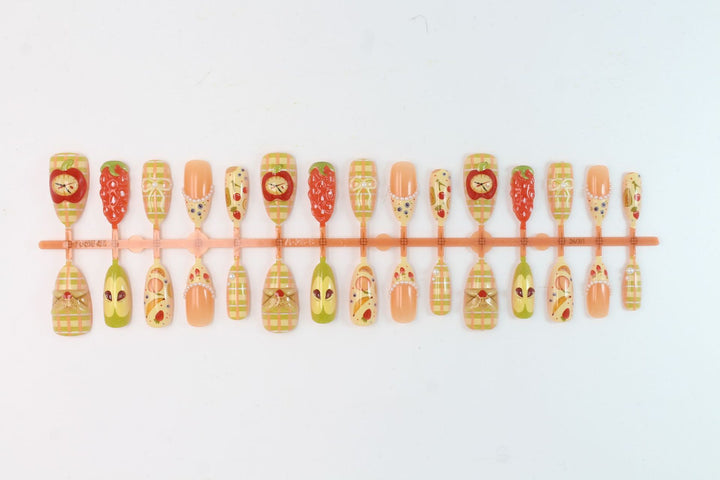Artificial nail set with cheerful fruit and flower motifs Stornfield
