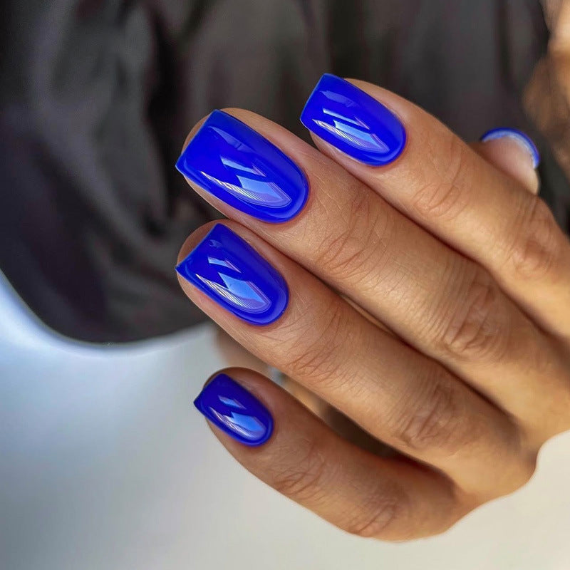 Artificial nail set with luxurious and glossy blue designs Stornfield