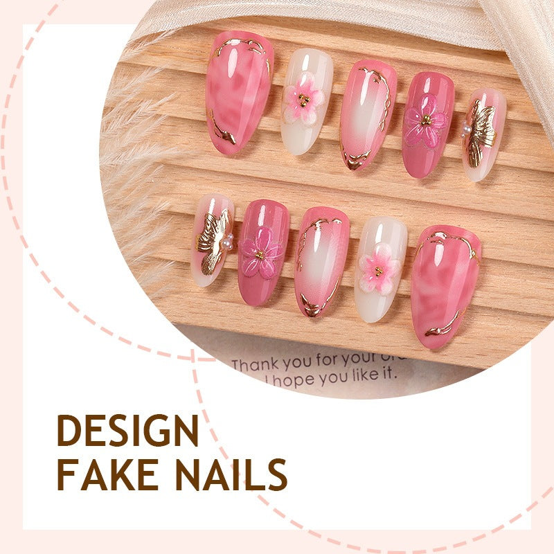 Artificial nail set with elegant flower and glitter details Stornfield