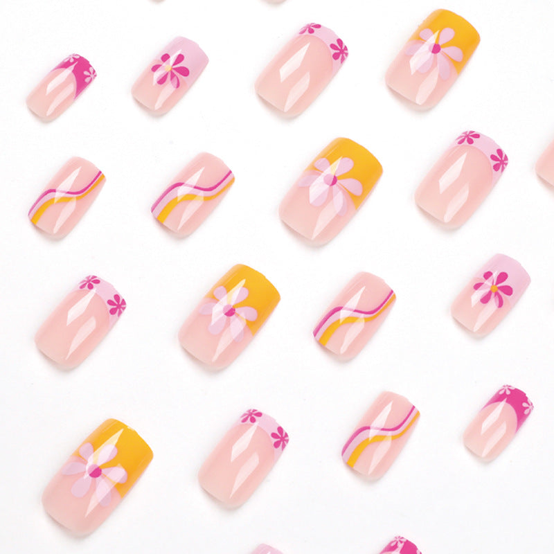 Creative Nail Art with Floral Design and Colorful Accents Stornfield