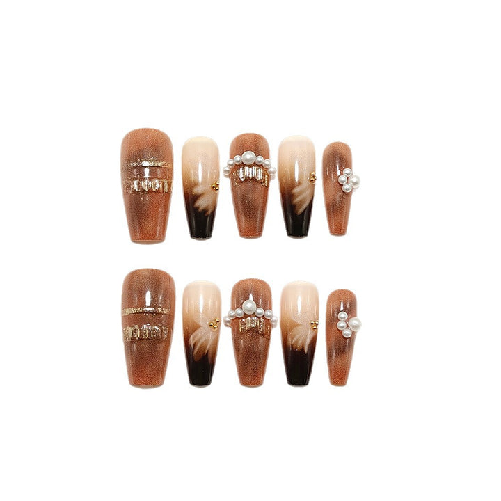 Artificial nails with elegant pearl and gold accents Stornfield